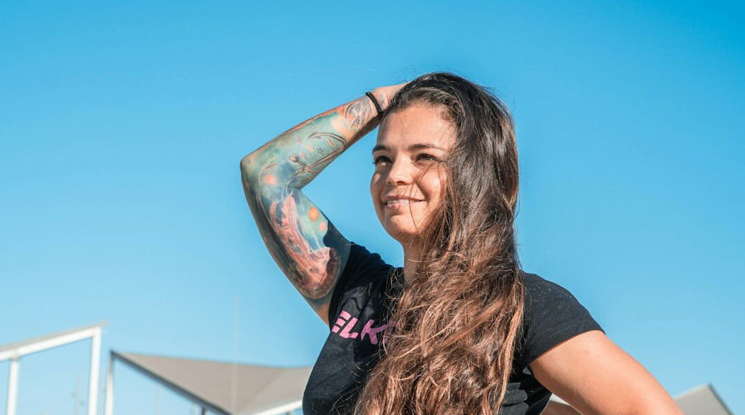 Portrait of a woman with long hair smiling