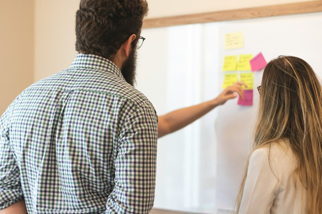 team using sticky notes for ideas