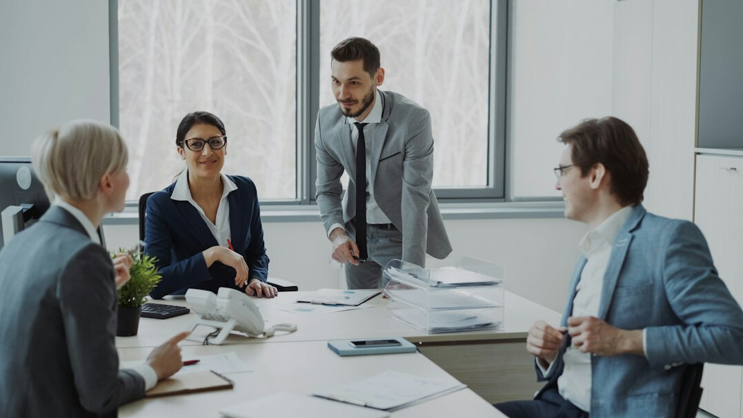 inspiring business leader with team