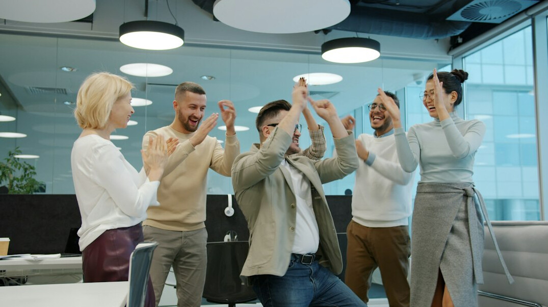 inspiring business leader with team